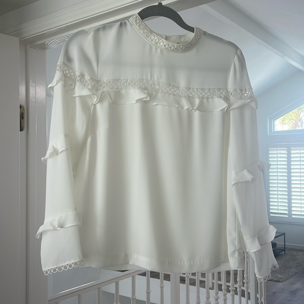 Lovely J crew cream blouse. Only worn once. Great condition and timeless piece.
